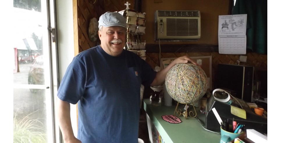 Norman Mackey with his rubber band ball - courtesy of Barbara McMichael